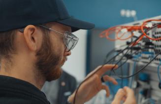 Electrical Student working with wires in the CDN Electrical Education Centre