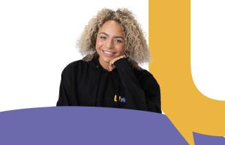 Happy young person smiling at the camera