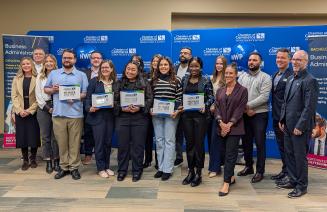 NWP Business Administration students and faculty pose in a group photo with members of the Grande Prairie & District Chamber of Commerce