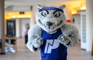 Farley the mascot giving the thumbs up