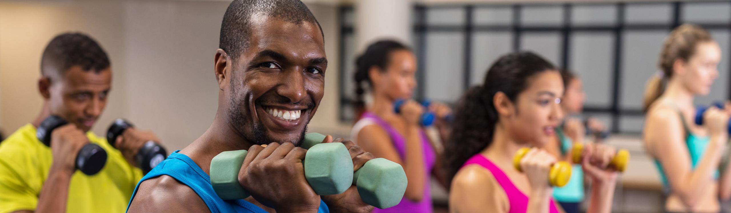 Happy people in a fitness class