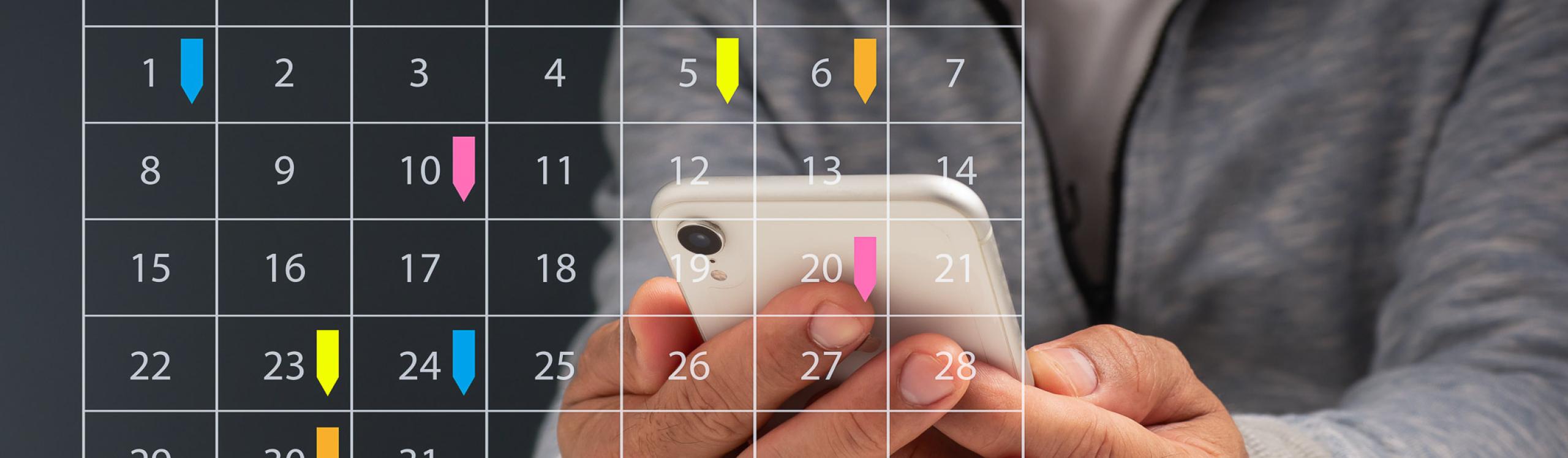 Image of a student's calendar containing lots of post it notes and appointments written down