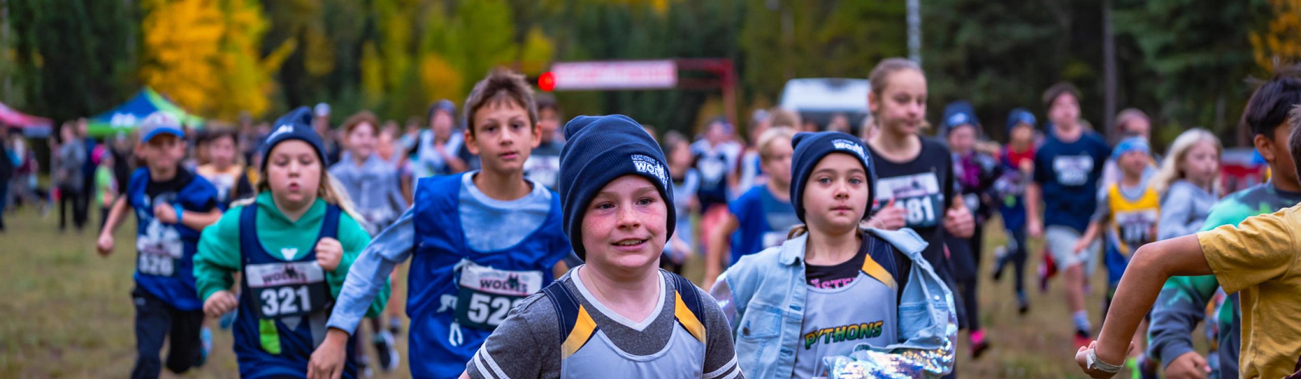 Kids participating in the run with the wolves event