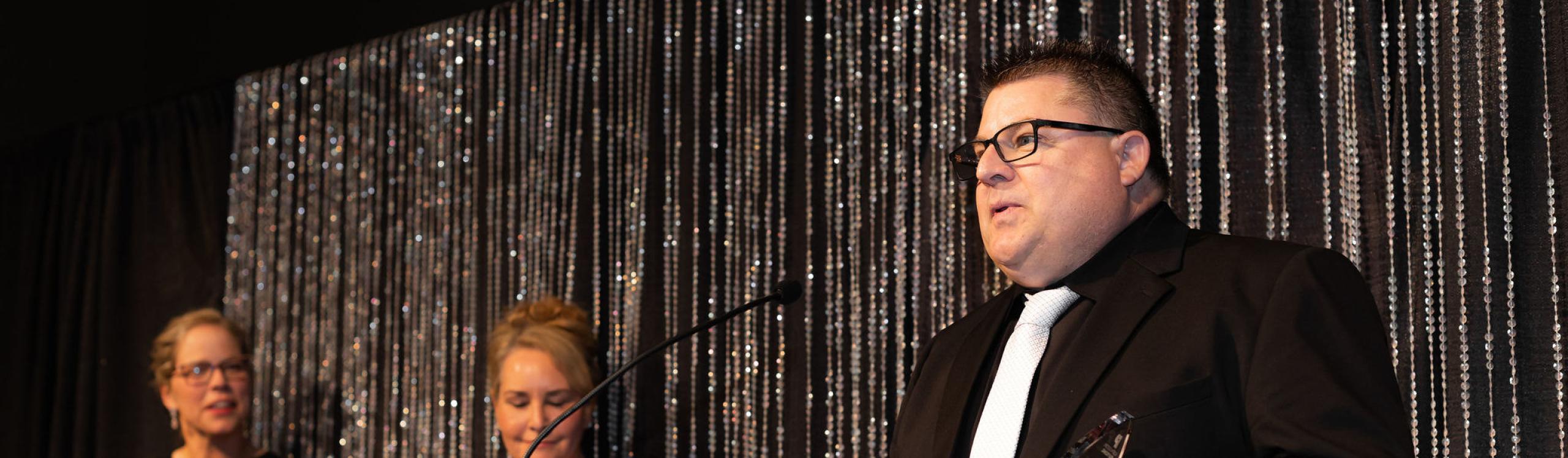 Warren Murray delivering his acceptance speech after receiving and award