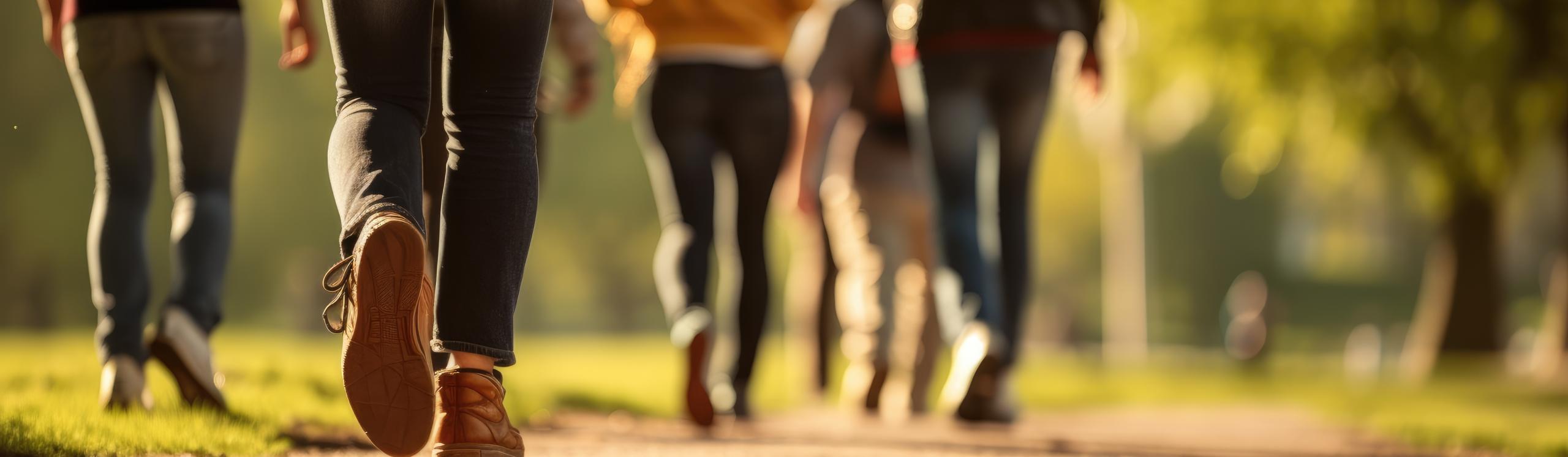 Close-up of a group of people walking.