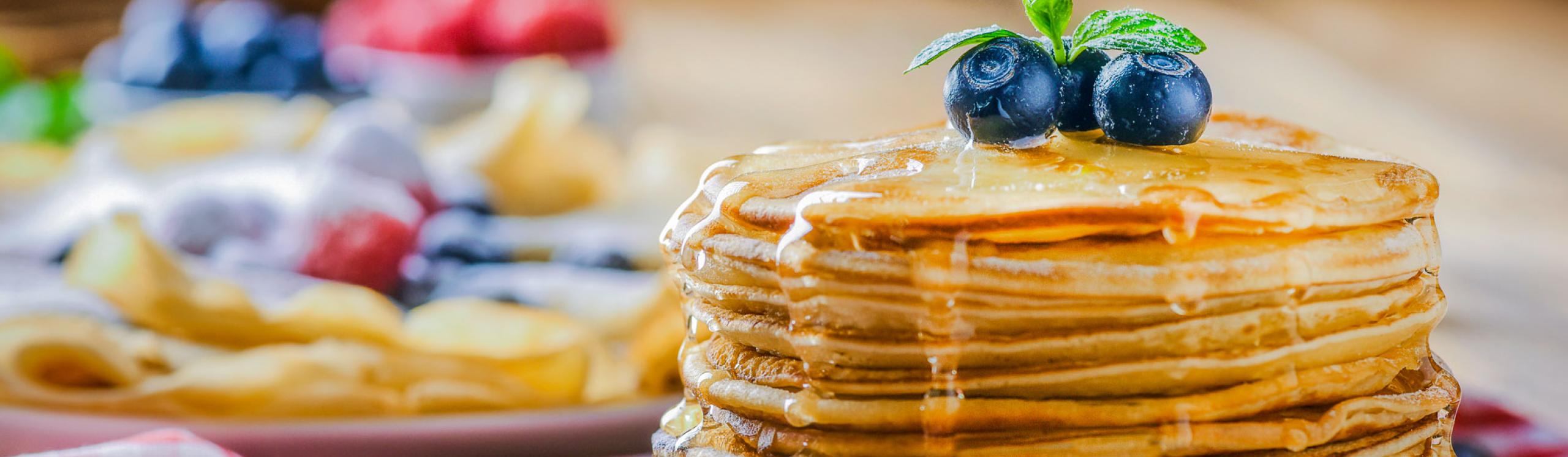 A stack of delicious looking blueberry pancakes