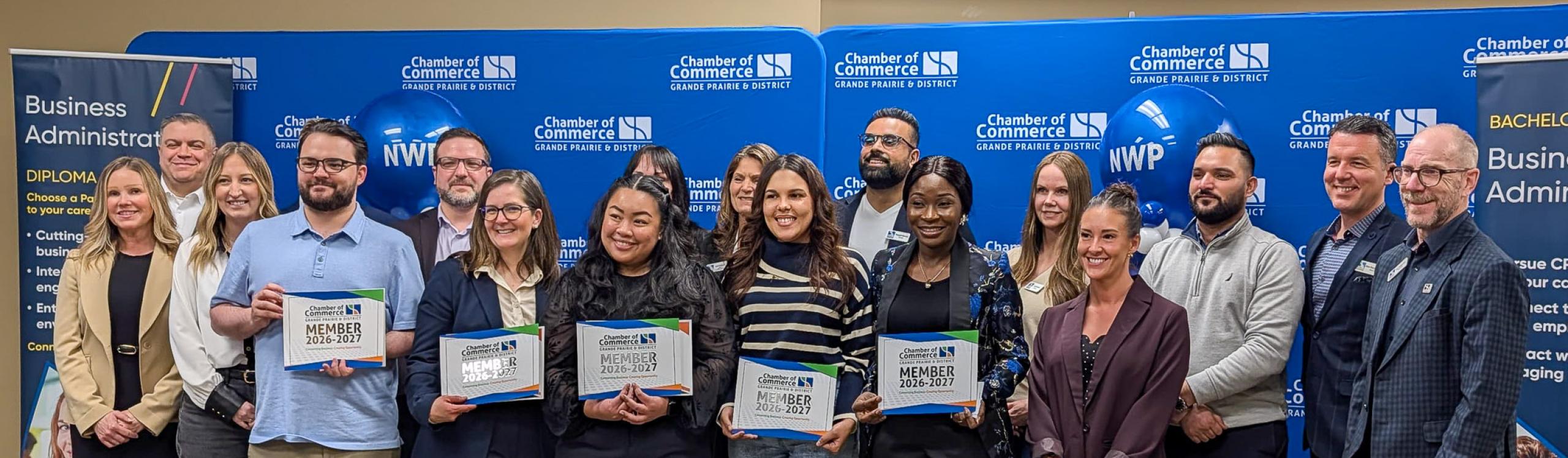 NWP Business Administration students and faculty pose in a group photo with members of the Grande Prairie & District Chamber of Commerce