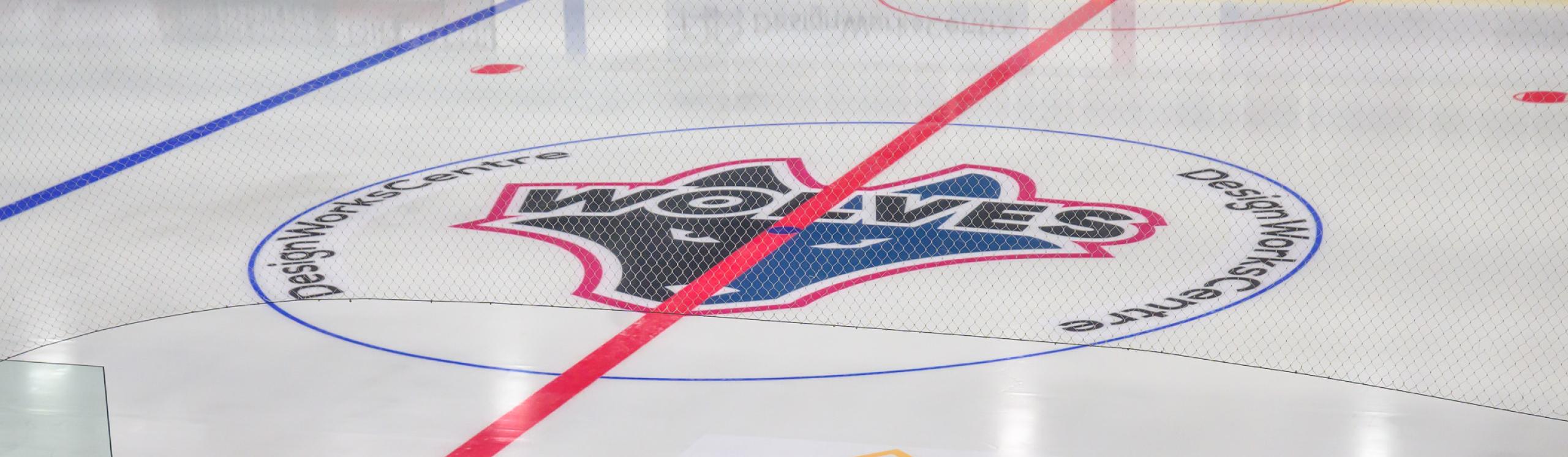 Centre ice of the Design Works Centre reflecting the Wolves Hockey crest