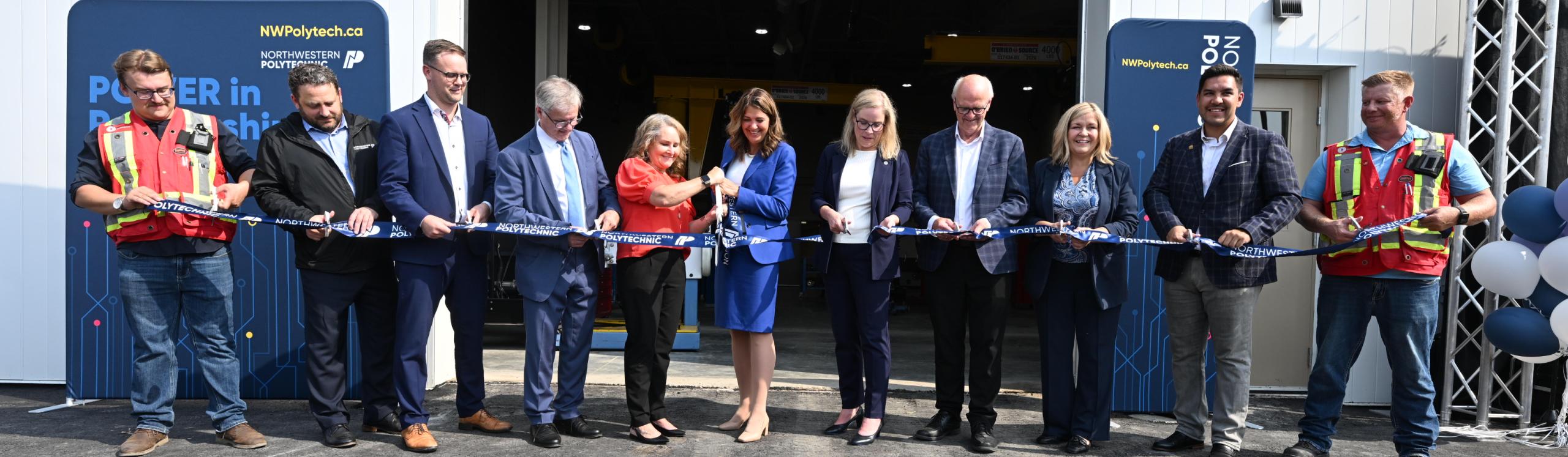 Alberta Premier, Danielle Smith, flanked by NWP Chair, Shawna Miller (L) and NWP President and CEO, Vanessa Sheane cut the ribbon to officially open the NWP Skilled Trades Training Centre (R)